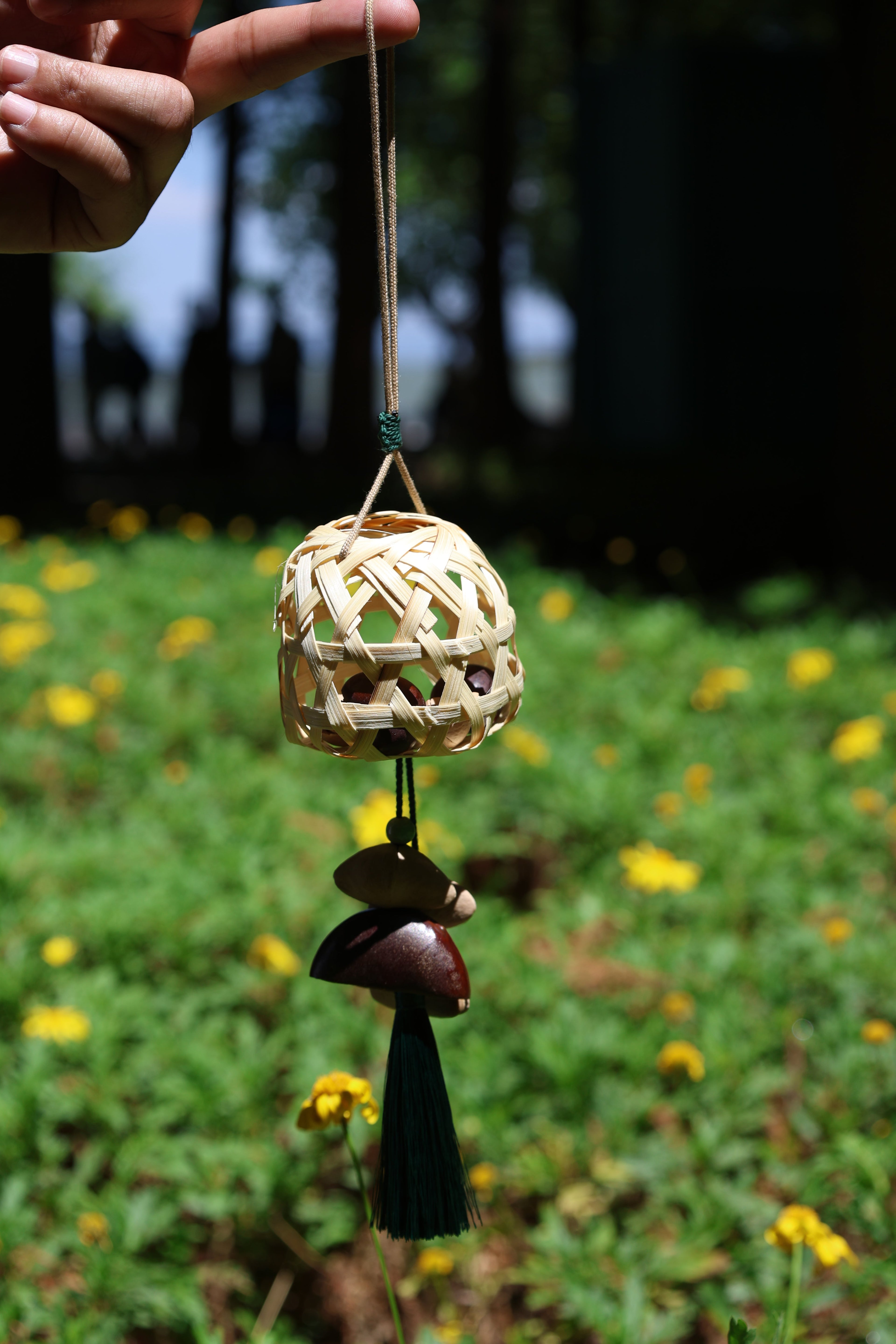 "The Bamboo Lantern" - Hand-Woven Cage Charm with Seed Bells & Emerald Tassel