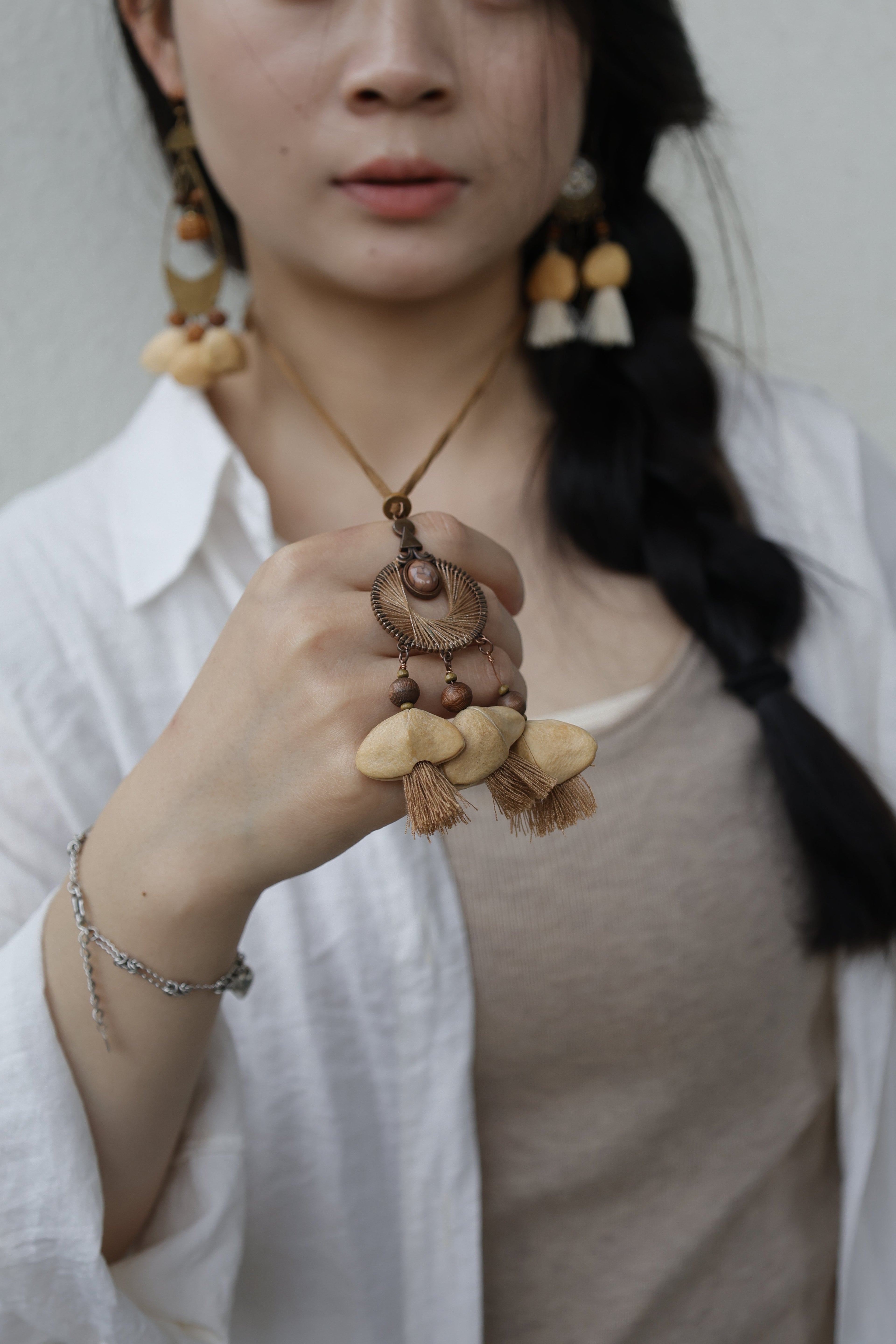"The Sunset Weaver" - Bronze Woven Mandala Necklace with Natural Seeds & Brown Tassels