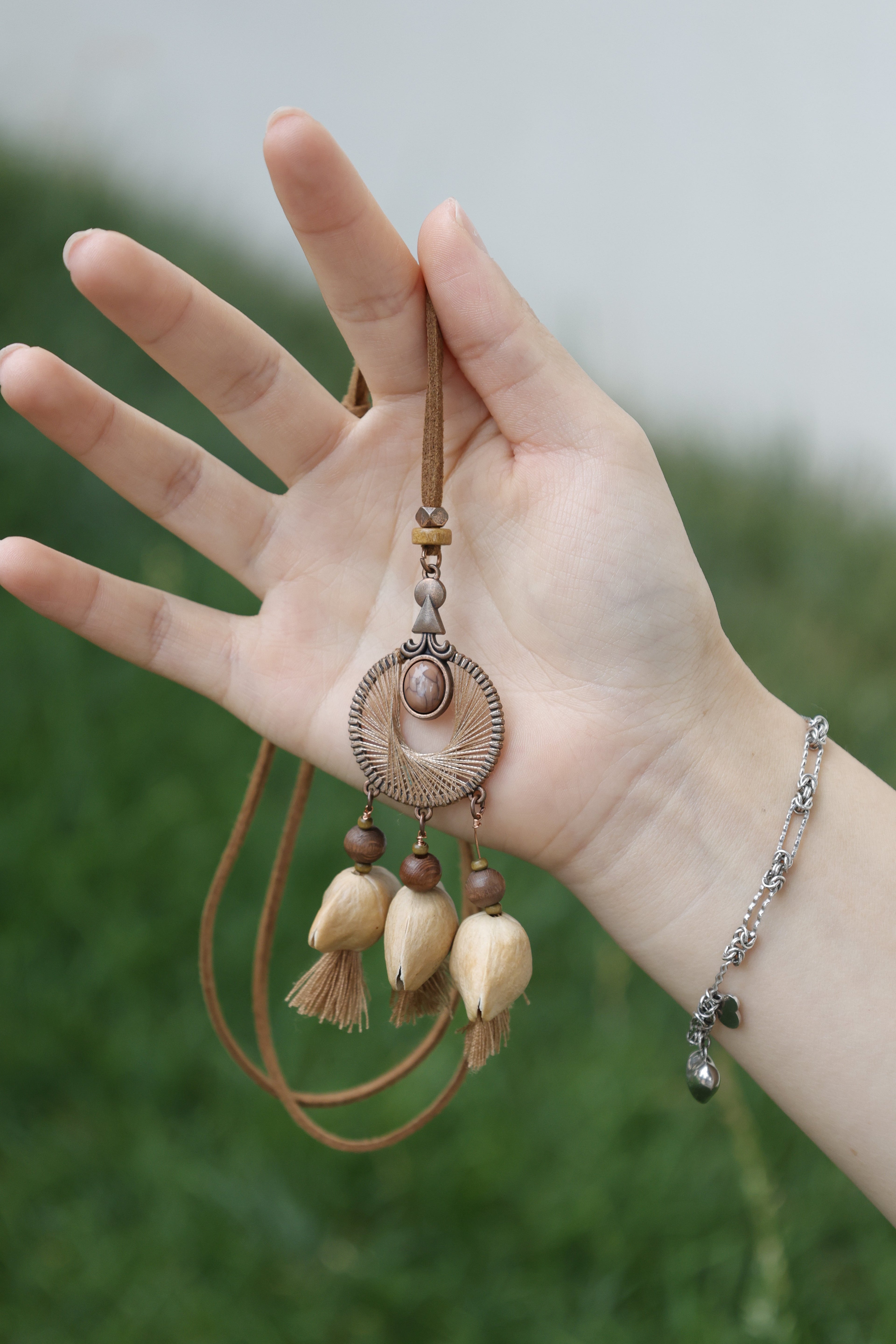 "The Bronze Dreamer" - Spiral Woven Mandala Pendant with Natural Seeds & Latte Tassels