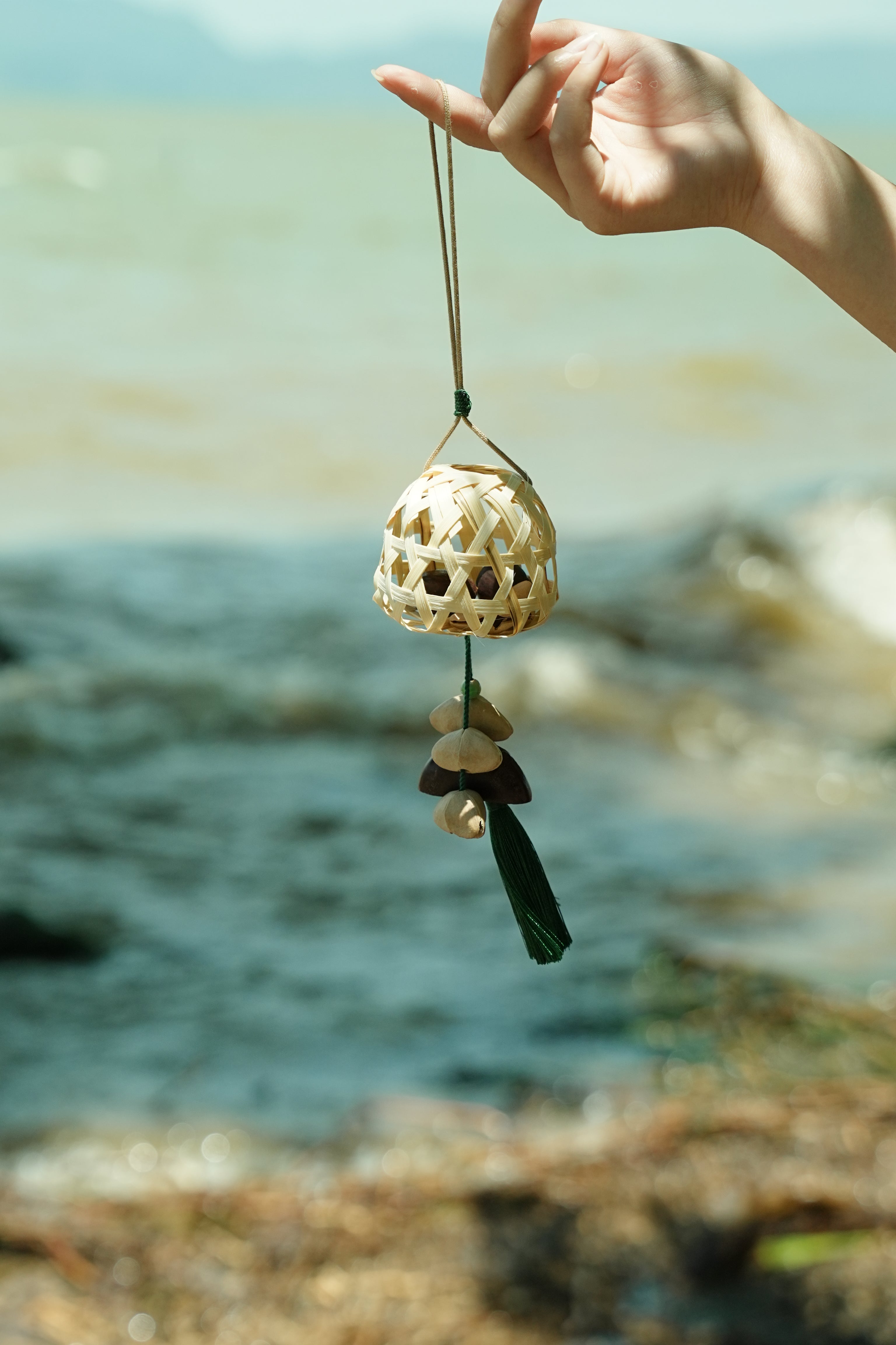 "The Bamboo Lantern" - Hand-Woven Cage Charm with Seed Bells & Emerald Tassel