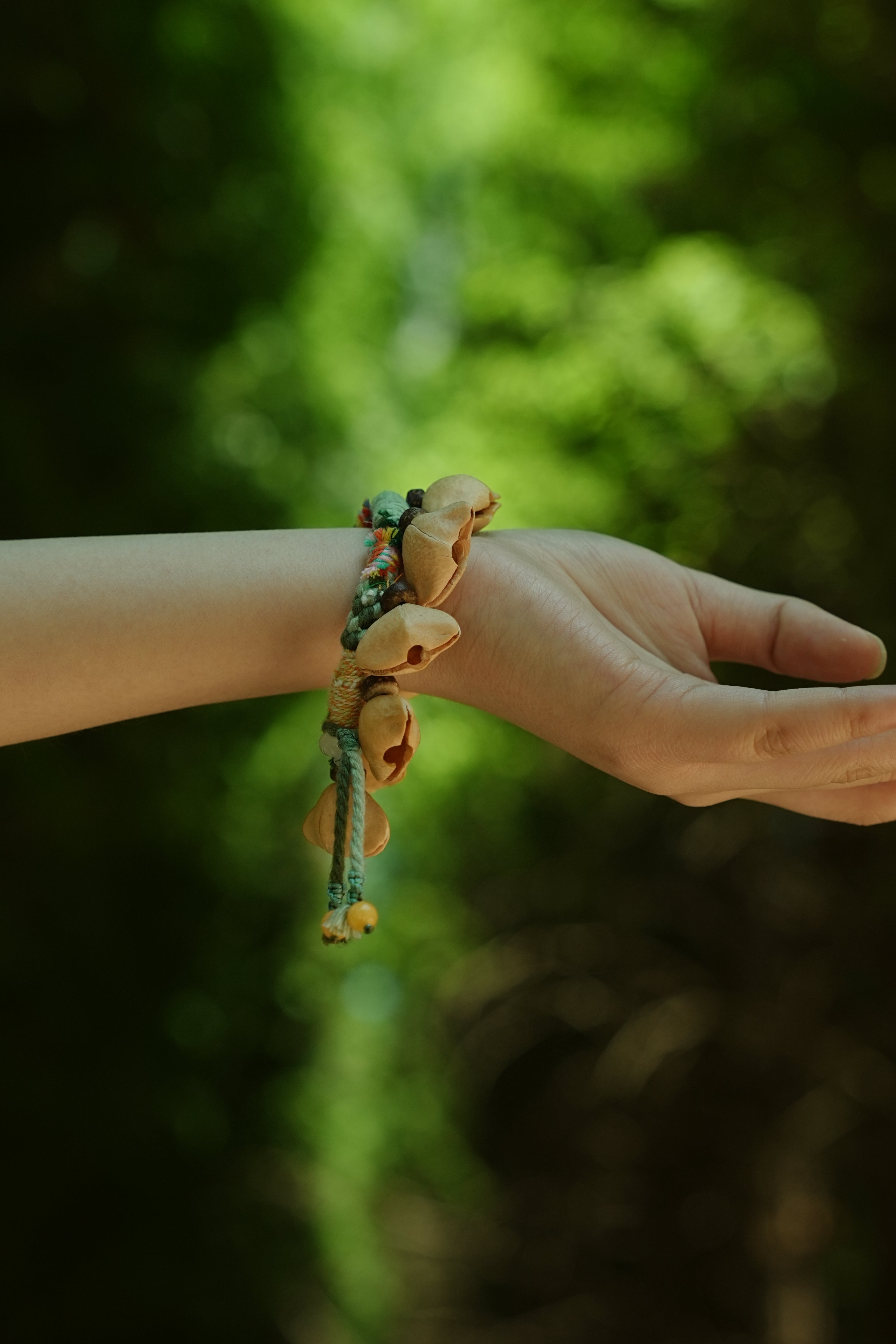 "The Happy Pistachio" - Hand-Braided Natural Shell Bracelet with Colorful Cord