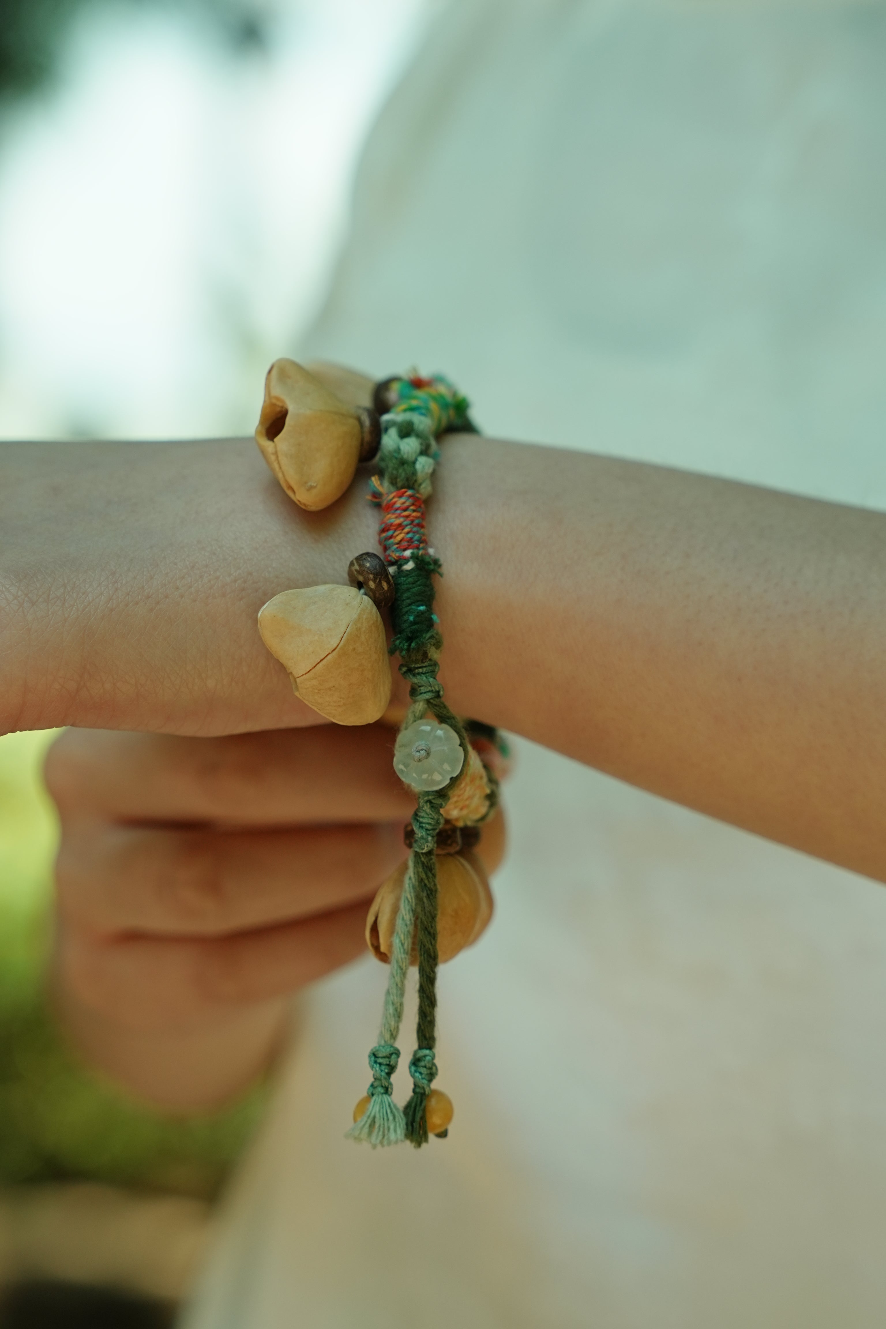 "The Happy Pistachio" - Hand-Braided Natural Shell Bracelet with Colorful Cord