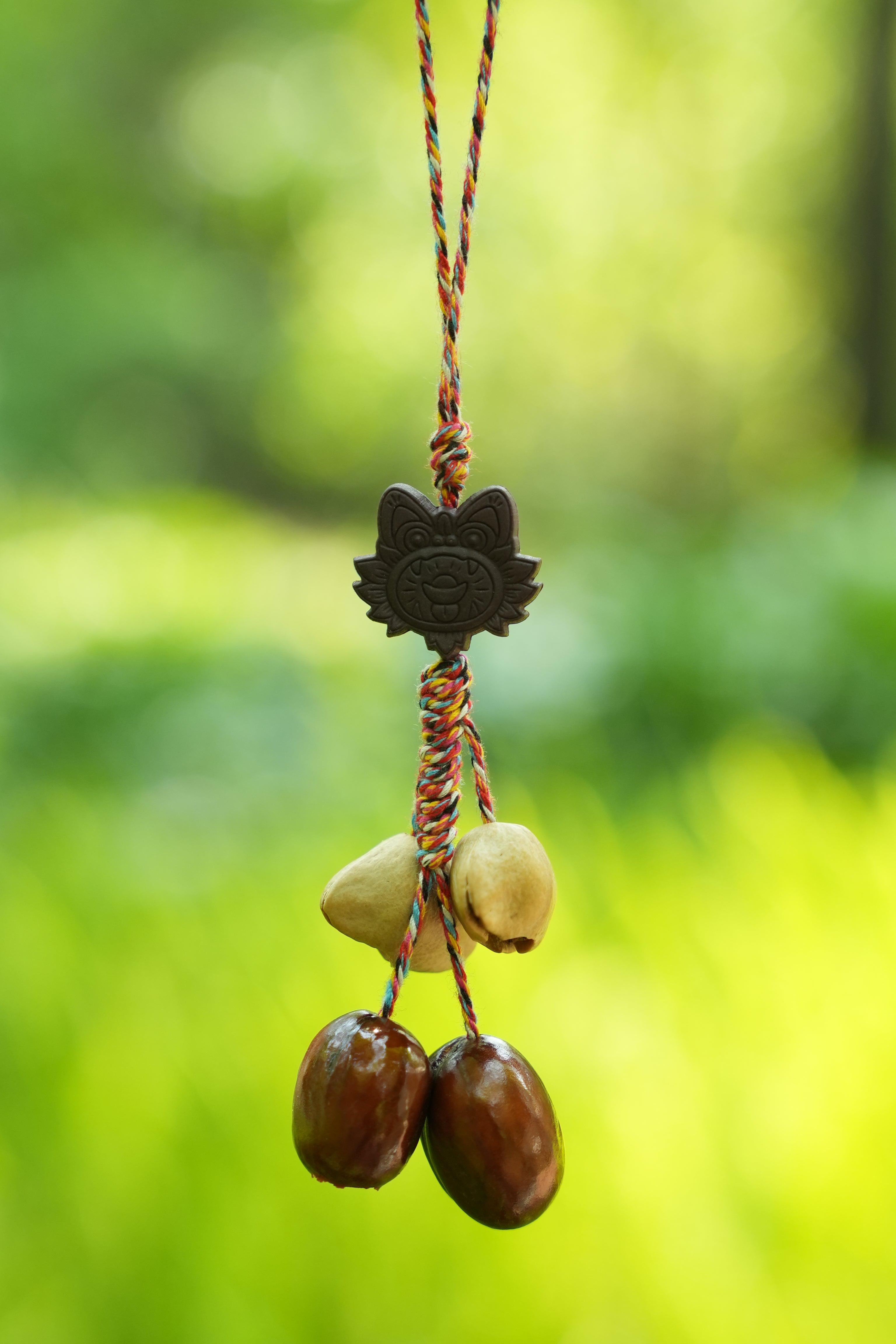 "The Brave Tiger Guardian" - Folk Art Tiger Head Charm with Colorful Cord & Seeds