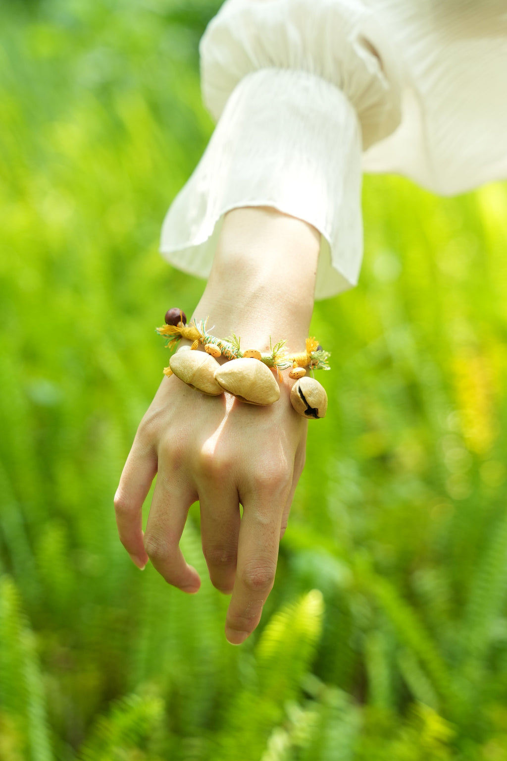 "The Meadow Dancer" - Yellow & Green Braided Bracelet with Natural Seed Bells
