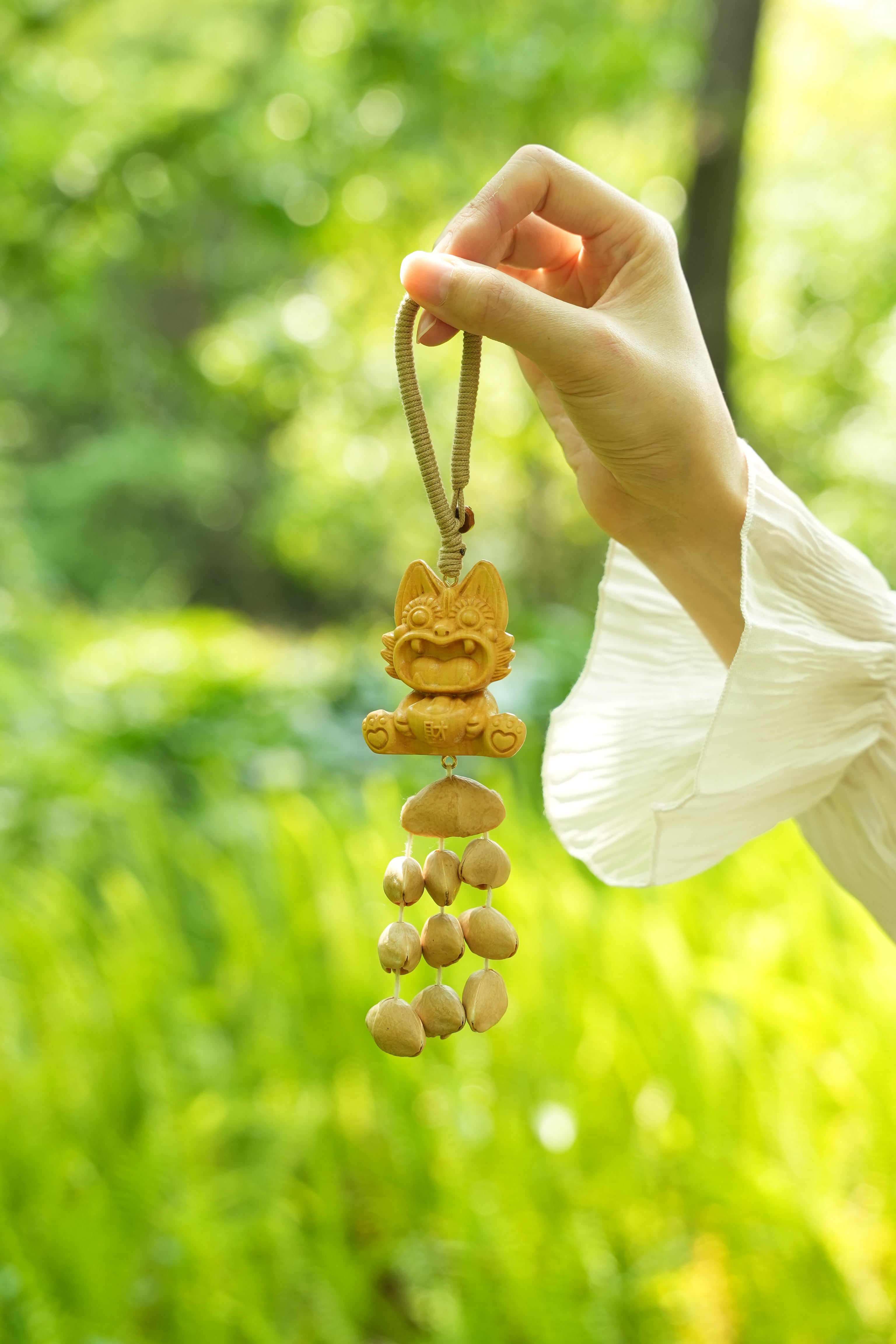 "The Fortune Tiger" - Hand-Carved Wood Wealth Charm with Cascading Seed Bells