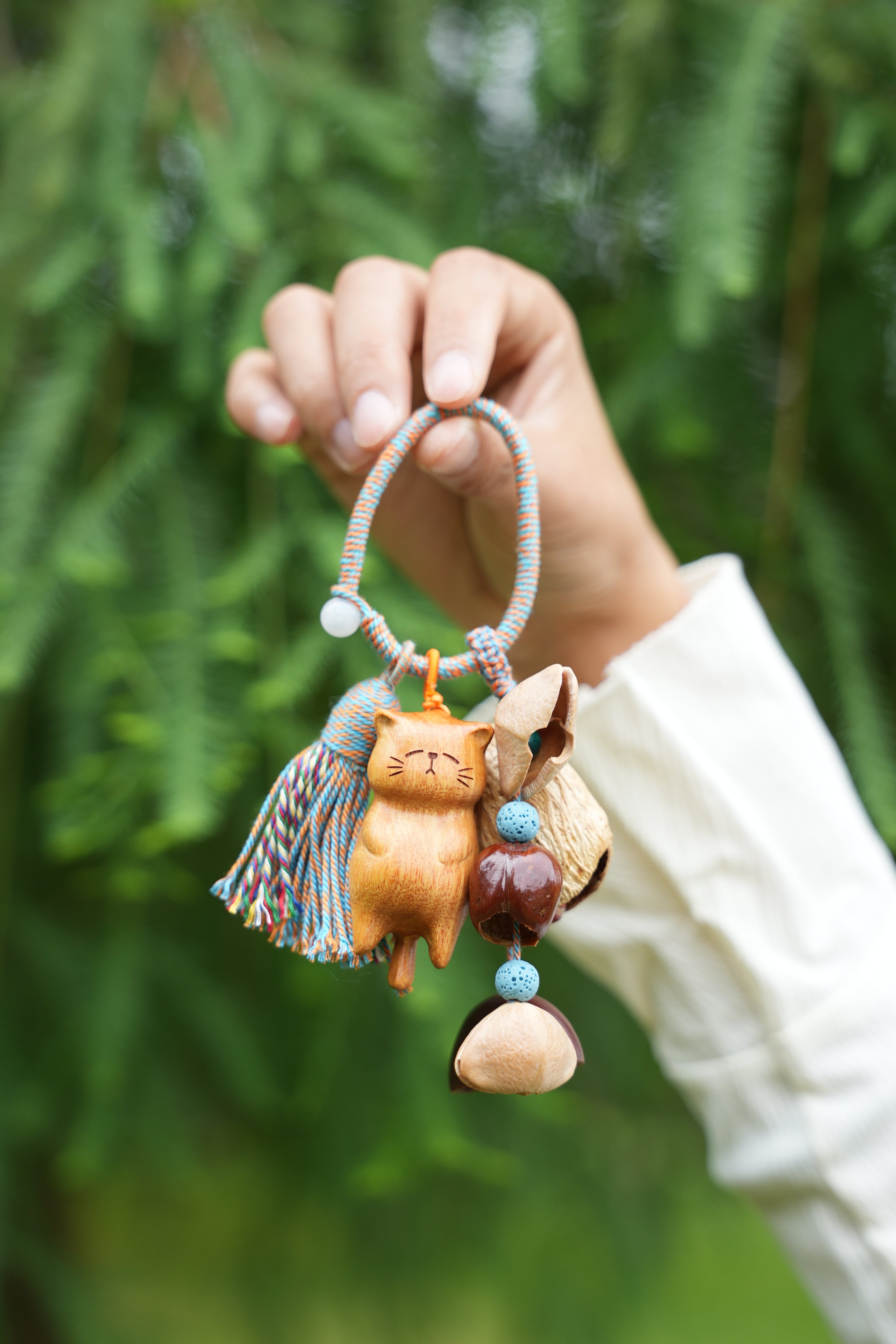 "The Naptime Kitty" - Hand-Carved Wooden Cat Charm with Natural Seeds & Tassel