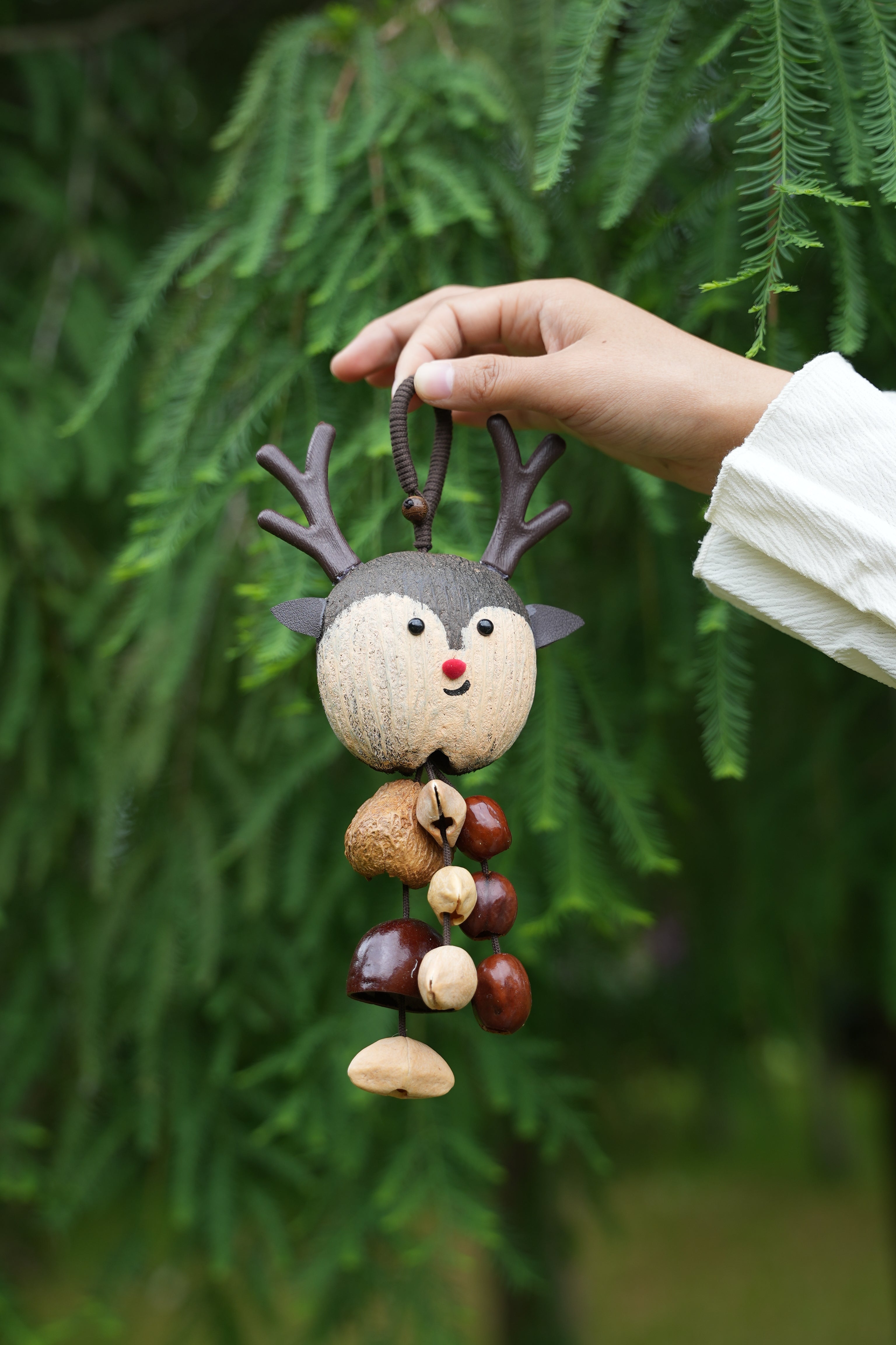"The Forest Reindeer" - Hand-Painted Shell Charm with Antlers & Seed Bells