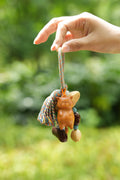 "The Naptime Kitty" - Hand-Carved Wooden Cat Charm with Natural Seeds & Tassel