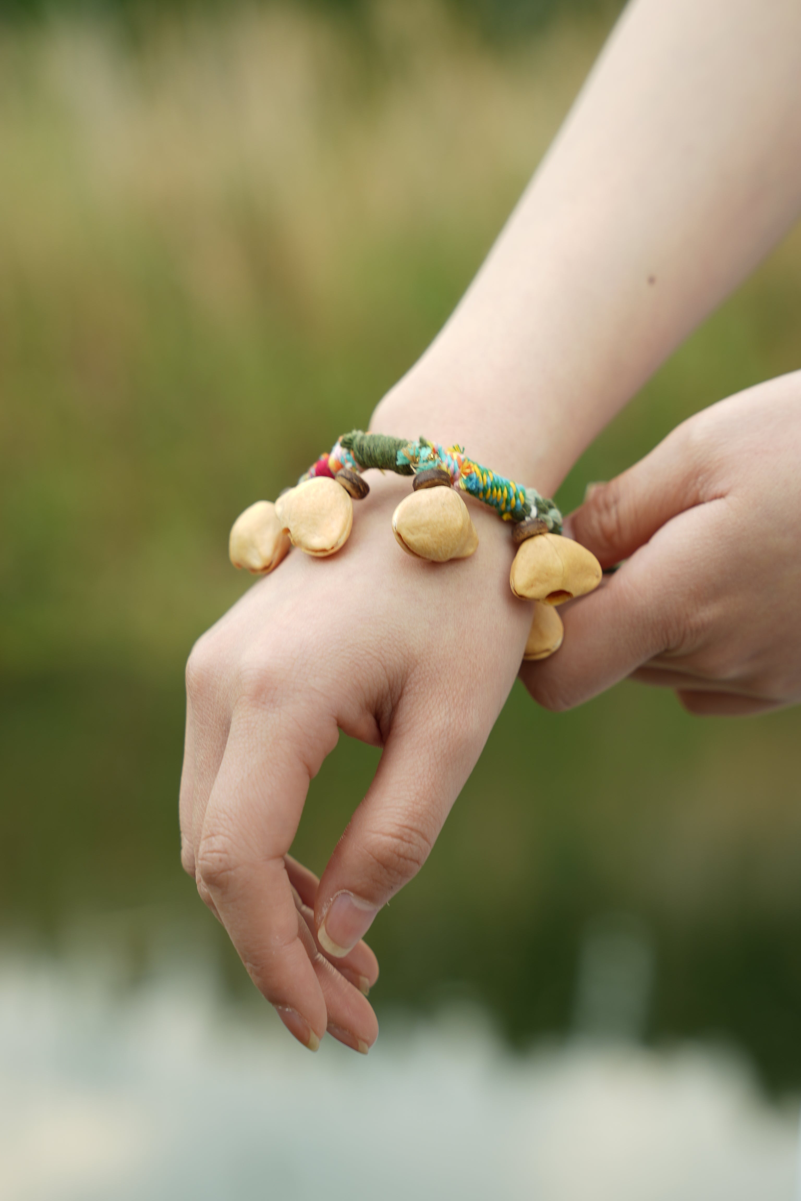 "The Happy Pistachio" - Hand-Braided Natural Shell Bracelet with Colorful Cord