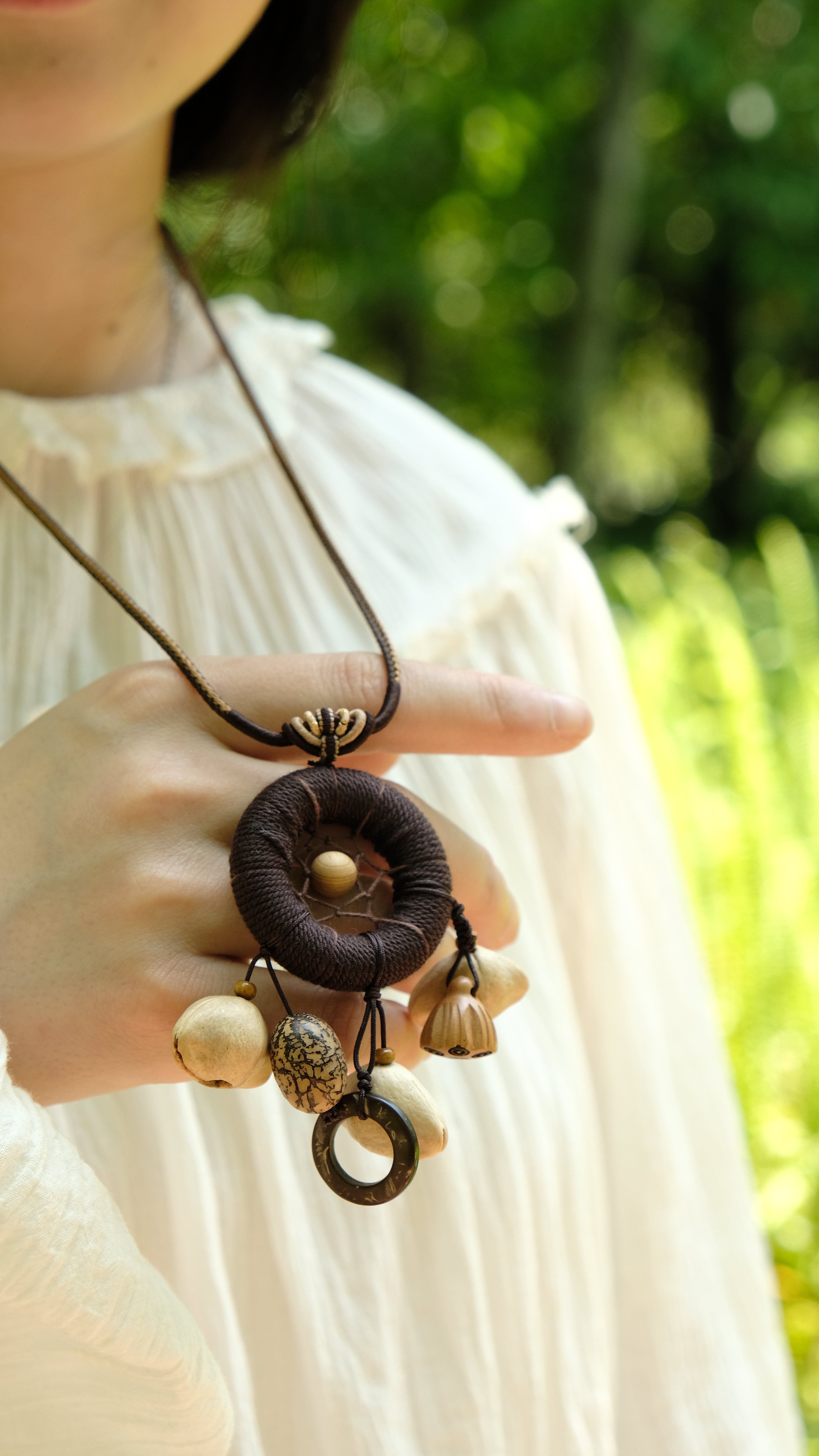 "The Dream Weaver" - Hand-Woven Dreamcatcher Necklace with Natural Seeds
