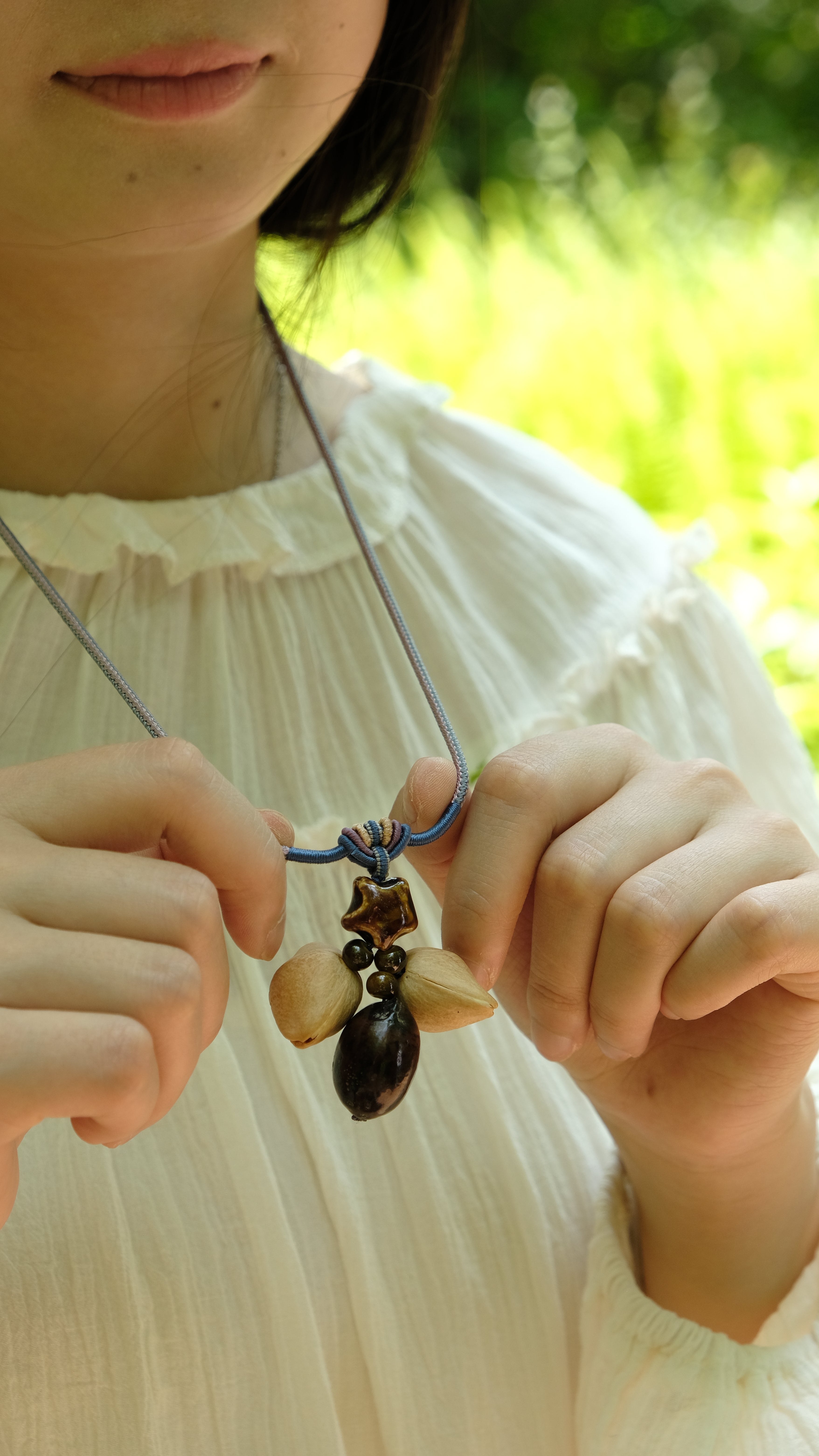 "The Guiding Star" - Natural Seed Pendant Necklace with Glazed Star Bead